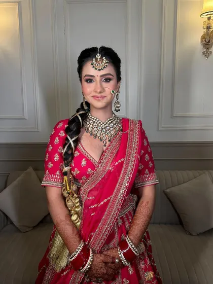 A smiling portrait of our beautiful Sikhni bride, showcasing the joy and radiance of her wedding day.