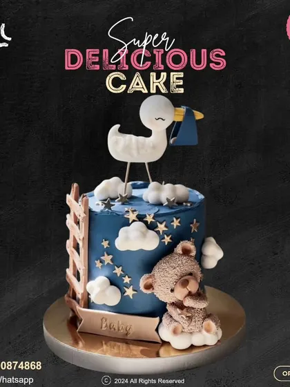 A sweet and serene baby-themed cake. This design features a deep blue night sky with stars, a sleeping teddy bear, and a stork delivering a precious bundle, perfect for a baby shower.