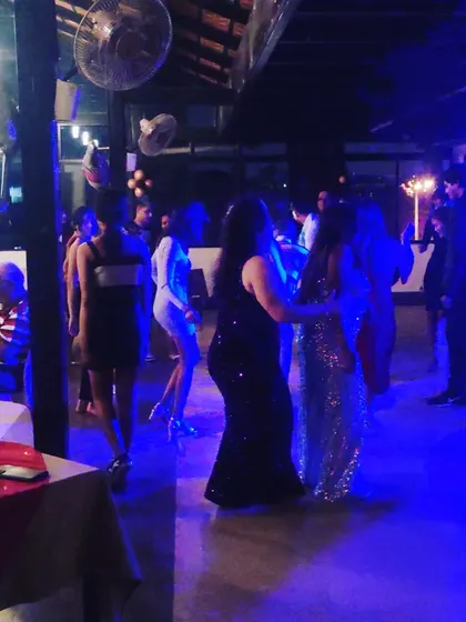 Guests dancing the night away at a private party.