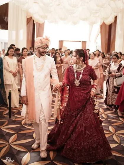 The walk together as husband and wife. We capture this significant moment as the couple makes their way through the aisle, surrounded by their loved ones.