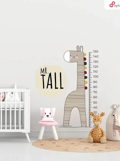 A giraffe growth chart wall decal. This is a fun and interactive way to track your child's height as they grow.