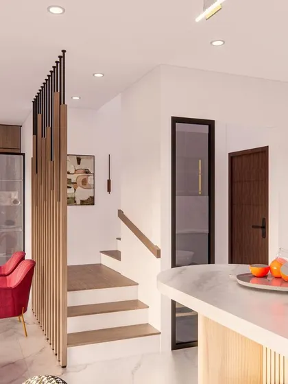 This view shows the transition from the living room to the kitchen, highlighting the open and connected feel of the 'Eleganza' project.