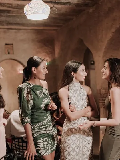 Candid moments and conversations from the welcome dinner, setting a warm and intimate tone for the wedding.