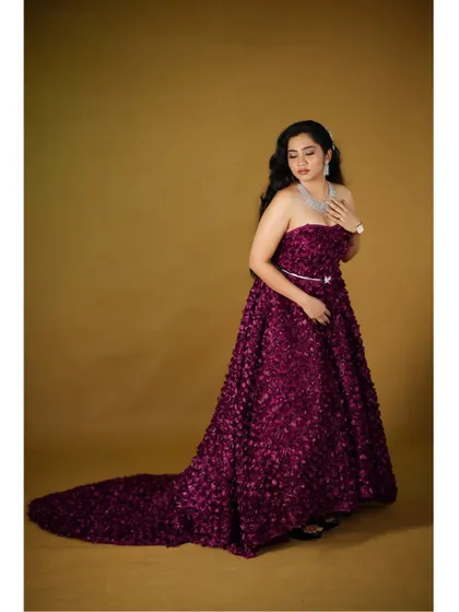 Another elegant pose in the wine floral high-low gown.