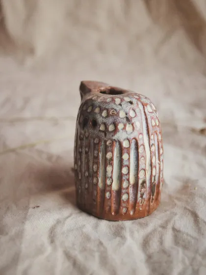This little bird whistle has such a lovely, textured surface. It feels ancient and modern at the same time.