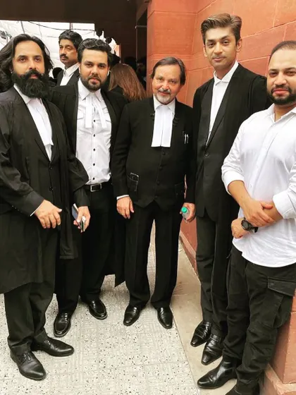 A candid moment with colleagues at the Supreme Court. We support each other in and out of the courtroom.