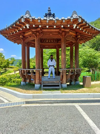 Posing inside the traditional wooden pagoda in Muju.