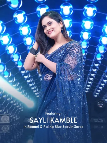 Featuring singer Sayli Kamble in a dazzling Rabani & Rakha blue sequin saree.