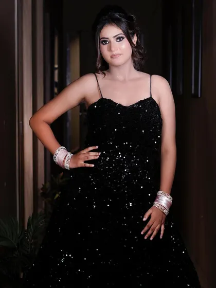 A full length shot of the black sequined gown. I teach my students to create makeup that is elegant and sophisticated enough for the most formal events.