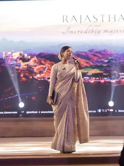 Addressing the audience at "Rising Rajasthan". My script for the evening was crafted to tell the story of Rajasthan's progress, weaving together its rich history with its ambitious future.