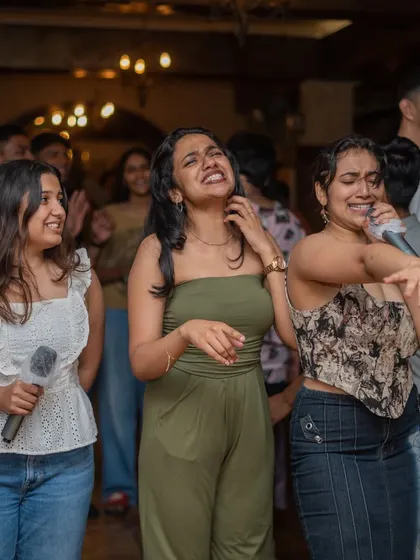 Capturing the fun moments between songs. It's a party where everyone feels like part of the action.
