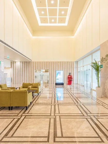 The main lobby of the repurposed Fortis Hospital retains a sense of openness and grandeur. We designed the space with clear circulation paths and comfortable seating areas, ensuring that the first point of contact for patients is calm, organized, and reassuring.