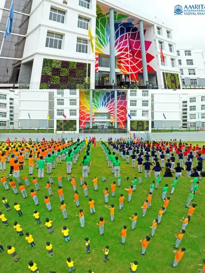 An aerial photograph taken for Amrita International Vidyalayam, capturing hundreds of students in a colorful, coordinated formation on the school grounds. This demonstrates my ability to cover large-scale institutional events and promotional shoots with precision.