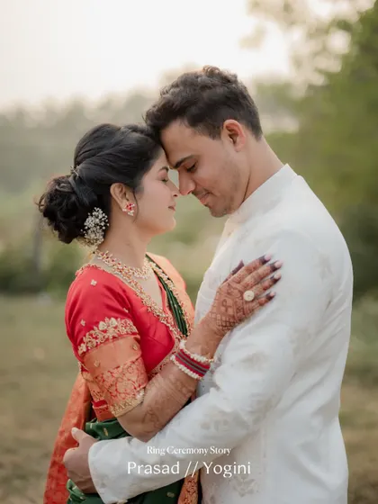 An intimate close-up of the engaged couple, their foreheads touching, capturing the quiet love between them.
