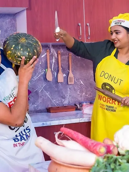 More playful antics from the kitchen shoot. Using props like vegetables and utensils helps create dynamic and entertaining pre-wedding photographs.
