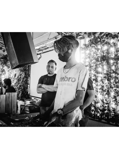A high-contrast black and white photo that puts the focus squarely on me and the mixer.