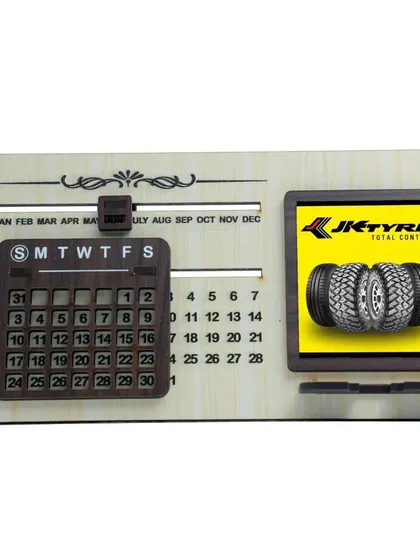 The light wood version of the JK Tyre calendar, offering a softer, more modern look for a corporate desk gift.