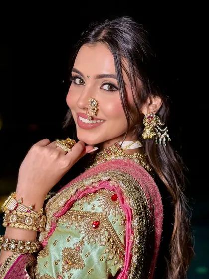 A final look at this stunning bride, where traditional charm meets modern glam in every detail.