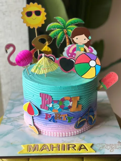 Pool vibes, but make it cake! Our summer-themed cakes bring the sunshine to your party, with designs featuring beach scenes, ocean waves, and fun caravan toppers.