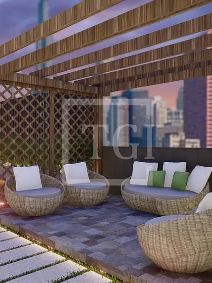 Another angle of the Mumbai pergola design, showing its placement in the garden and how it creates a defined, intimate zone within the larger terrace.