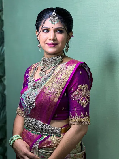 Another angle of this stunning bridal look, showing the versatility of the outfit for different poses.