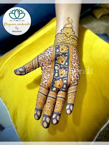 An elegant cutwork design featuring lotus flowers and a peacock, with bold negative space that makes the pattern pop.