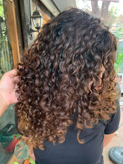 A close-up of the defined curls. The non-bleach color adds so much richness and shine. (No filter)