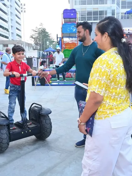 Cruising in style on a hoverboard. I can arrange for fun and modern rideables like these to be available for guests to try out in a designated safe area.