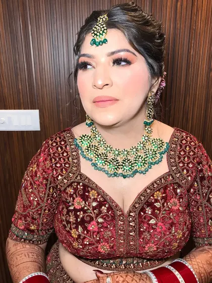A beautiful candid shot that captures her natural beauty, enhanced by the makeup.