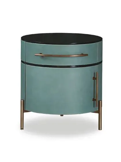 The PLUSE leather night table. The structure is curved plywood with a matte black-stained oak veneer, while the shutter and drawer front are covered in a beautiful sage-green leather, all resting on a hand-finished burnished metal base.
