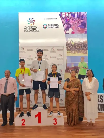 Photos from our successful summer camp and tournament at Shiksha Shikhar, showing students on the podium and in groups.