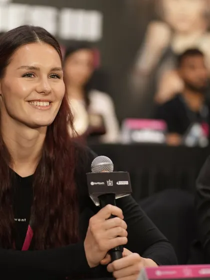 A glimpse of the press conference, featuring an international female fighter.