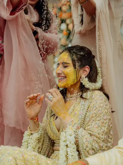 The pure joy on the bride's face during the flower shower. These are the candid, emotional moments that make a wedding truly special.