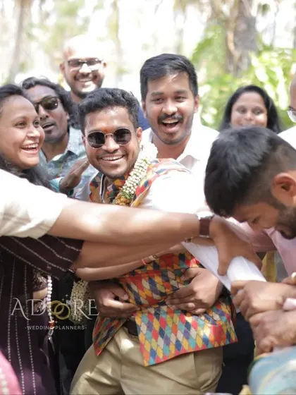 The groom's family and friends having a great time during the welcoming ceremony. We ensure the atmosphere is full of energy and joy from the very first moment.