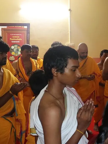 Students stand in prayer before beginning their practice. Every session at the Gurukul is initiated with reverence, acknowledging the divine nature of the knowledge we are about to receive.
