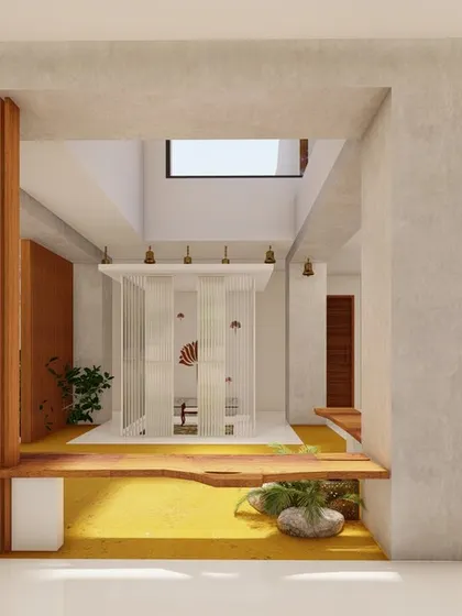 At the center of the home, we designed a glass-enclosed Puja room that sits within the courtyard. This modern interpretation of a sacred space allows it to be a visual focal point, connecting spirituality with daily life.