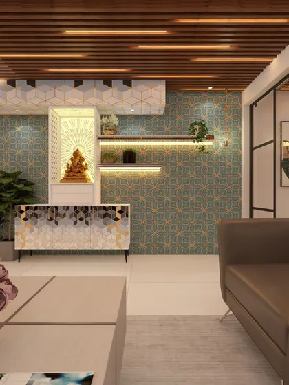 This office waiting area includes a serene puja unit, demonstrating how we can integrate spiritual elements into a corporate environment. The space is designed with patterned wallpaper and comfortable seating for visitors.
