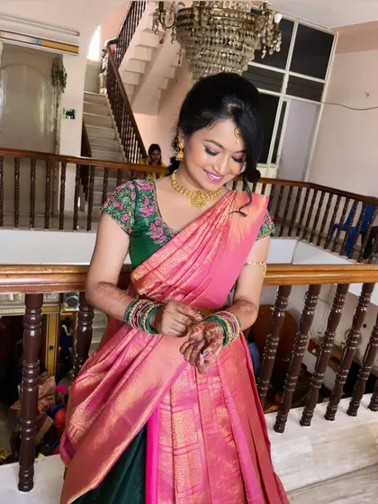 The complete look is perfect for any daytime family gathering or pooja.