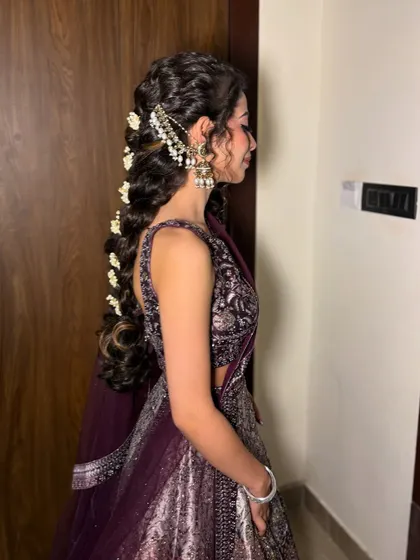 Another side view, highlighting the beautiful hair accessories.