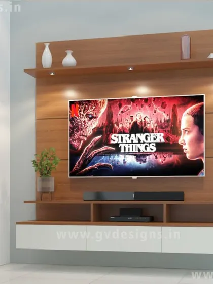 This wall-mounted floating entertainment unit is a smart way to save space while adding style. The symmetrical design includes double shelves for storing media devices and displaying decor, all finished in a warm wood laminate.