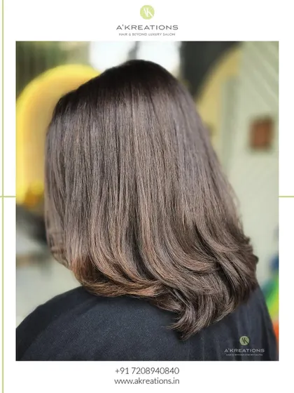 A no-bleach light brown balayage for a subtle, natural, and elegant enhancement. This technique is perfect for adding a touch of color without damage.