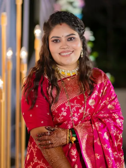 A radiant and happy bride. The makeup enhances her natural beauty and gives her a stunning glow for her reception.