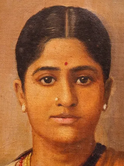 This stunning, delicate portrait of an unknown woman is by the artist V.S. Sharma, circa 1930-1940. The artist's use of subtle shading and fine brushstrokes brings out a serene and ethereal quality, capturing the elegance of the era.
