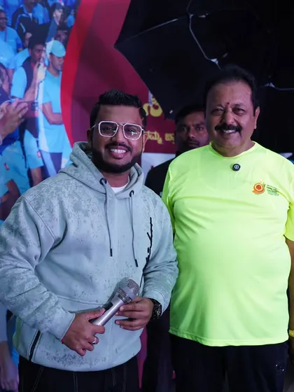 With Shri N. Cheluvarayaswamy, Minister of Agriculture, at the Millet Run 2025. His energy was infectious, as he ran and danced with participants despite the rain.