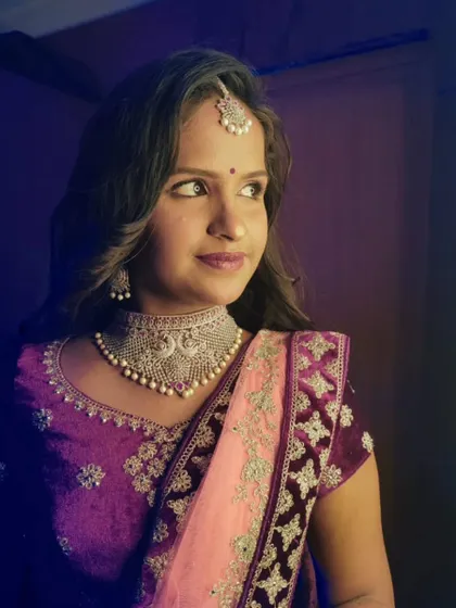 A beautiful portrait of Lakshmi. The lighting captures the shimmer on her eyes and the flawless finish of her skin.
