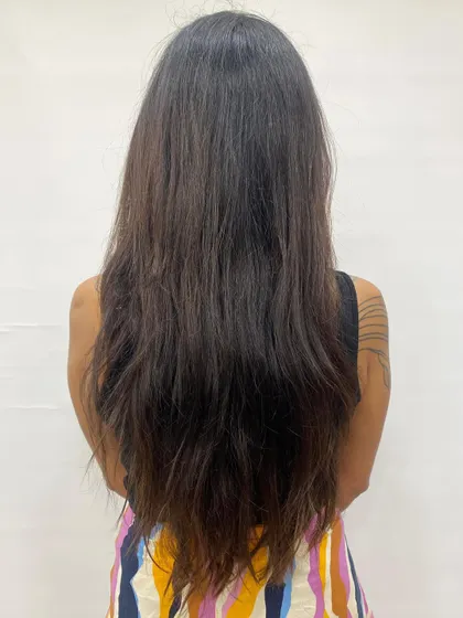 Holiday ready. This is the "before" shot of a client who needed a fresh cut and color before her trip.
