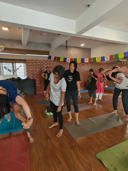 Laughter and focus go hand in hand during our workshops. These students are exploring a challenging but rewarding partner balance and stretch.