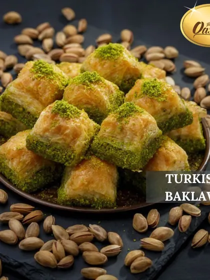 A platter of my Turkish Pistachio Baklava, surrounded by the high-quality pistachios I use. The vibrant green of the nuts against the golden pastry is a feast for the eyes.