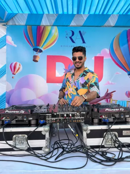 All smiles from behind the decks at a wedding pool party. I make sure the music is perfect for every part of the wedding festivities, day or night.