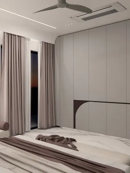 This view of the SVASA 2A master bedroom highlights the custom wardrobe. The doors feature a unique, flowing inlay that breaks the monolithic surface, turning a functional element into a piece of sculptural art.